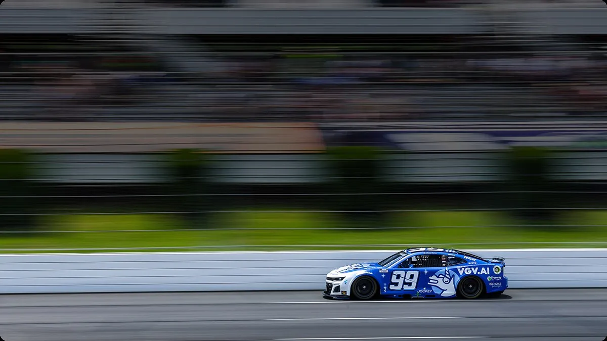 The Trackhouse Racing number 99 car at speed on track