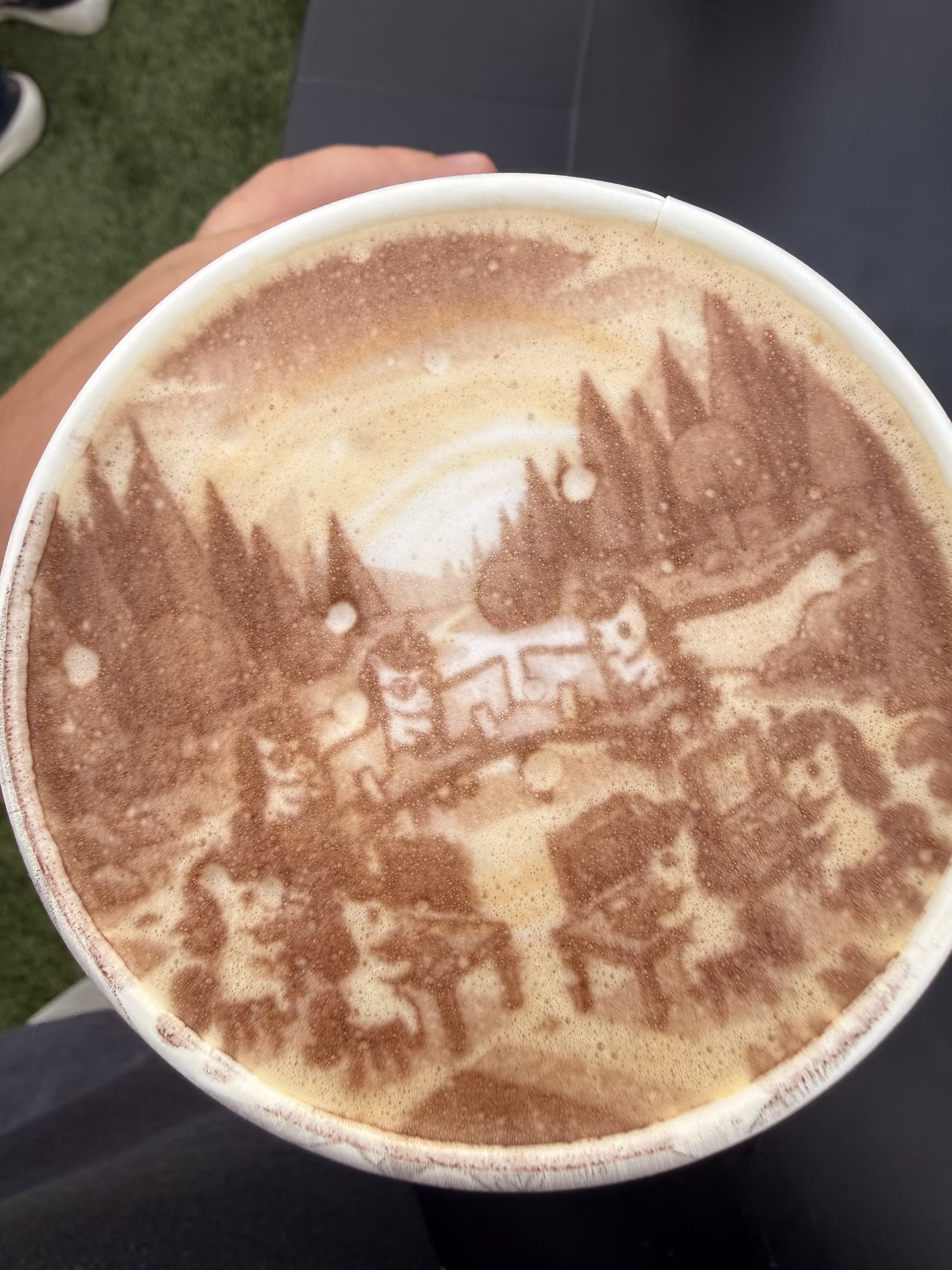 A cappuccino with AI-generated latte art printed directly on the foam.